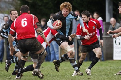 27.03.10 Bedwas RFC v Cardiff RFC - Swalec Cup 1/4 final - Cardiff's Jamie Ringer is tackled by Bedwas' Adam Greendale. 