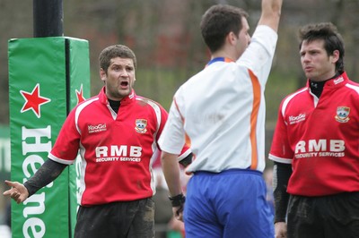 27.03.10 Bedwas RFC v Cardiff RFC - Swalec Cup 1/4 final - Bedwas' Stuart Thomas challenges referee Leighton Hodges as he awards Cardiff a penalty try. 