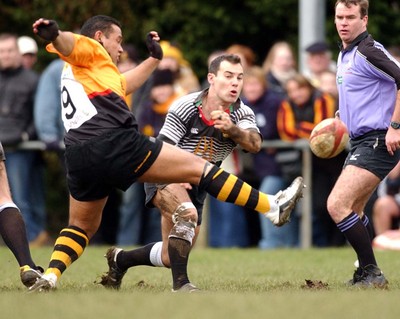 080203 - Bedwas v Newport - Principality Cup - Bedwas' Wayne Bray gets ball away as Ofisa Tonu'u challenges