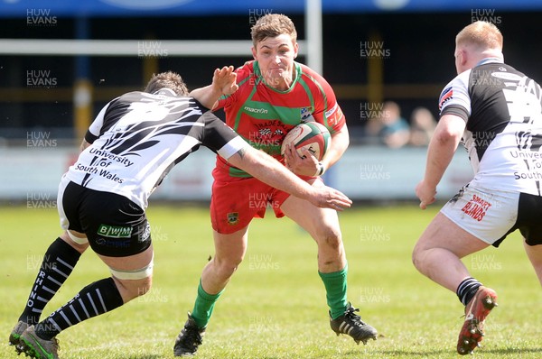 090416 Bedwas v Pontypridd - Fosters Cup Final Matthew John of Bedwas hands off Rhys Shellard of Pontypridd