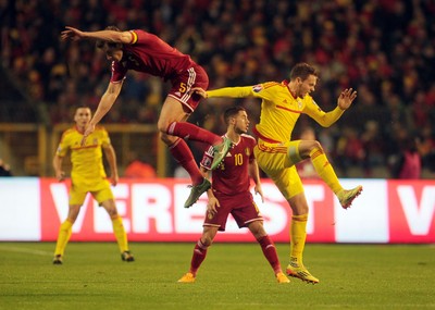 161114 - Belgium v Wales - European Championship Qualifier - Jan Vertonghen of Belgium and Chris Gunter of Wales collide in the air