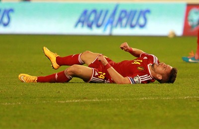 161114 - Belgium v Wales - European Championship Qualifier - Dries Mertens of Belgium goes down injured after colliding with Chris Gunter of Wales 