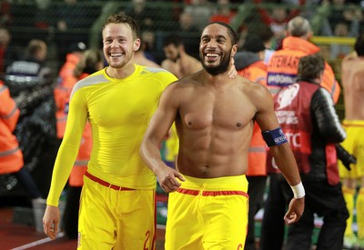 161114 - Belgium v Wales - European Championship Qualifier - Chris Gunter and Ashley Williams of Wales celebrate after the game