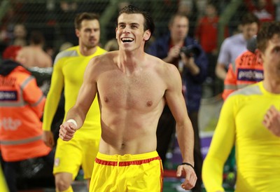 161114 - Belgium v Wales - European Championship Qualifier - Gareth Bale of Wales celebrates topless after the game
