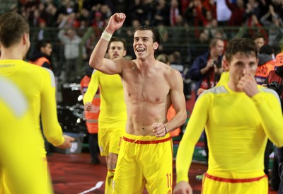 161114 - Belgium v Wales - European Championship Qualifier - Gareth Bale of Wales celebrates topless after the game