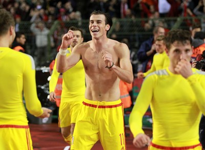 161114 - Belgium v Wales - European Championship Qualifier - Gareth Bale of Wales celebrates topless after the game