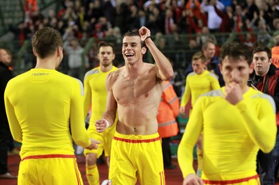 161114 - Belgium v Wales - European Championship Qualifier - Gareth Bale of Wales celebrates topless after the game