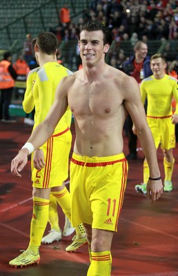 161114 - Belgium v Wales - European Championship Qualifier - Gareth Bale of Wales celebrates topless after the game