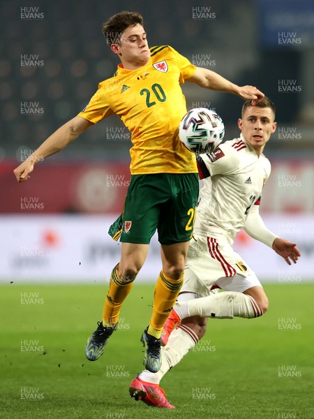 240321 - Belgium v Wales - FIFA World Cup Qualifier - Daniel James of Wales is challenged by Thorgan Hazard of Belgium