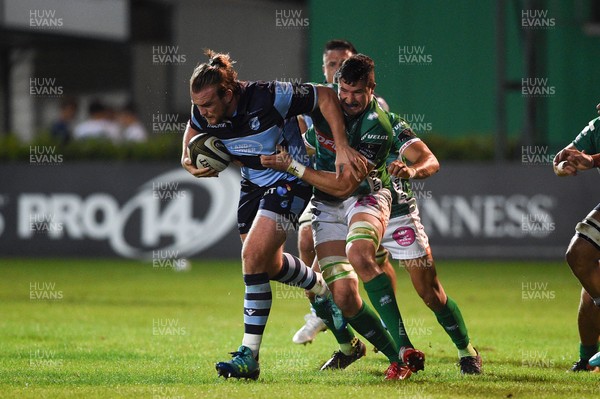 080918 - Benetton Rugby v Cardiff Blues - Guinness PRO14 -  Kristian Dacey of Cardiff Blues is tackled by Sebastian Negri of Benetton