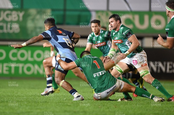 080918 - Benetton Rugby v Cardiff Blues - Guinness PRO14 -  Rey Lee-Lo of Cardiff Blues is tackled by Nicola Quaglio of Benetton
