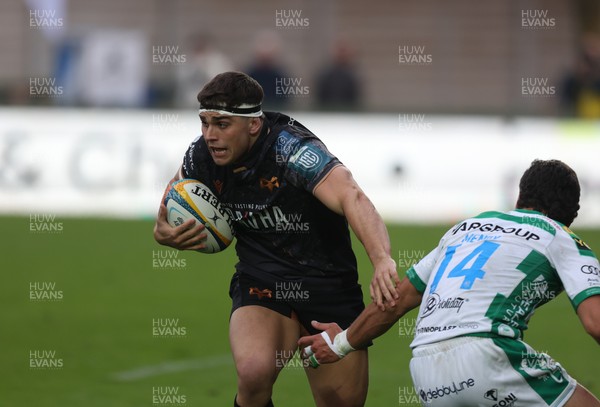 210326 - Benetton Rugby v Ospreys - United Rugby Championship - Lewis Lloyd of Ospreys takes on Ignacio Mendy of Benetton 