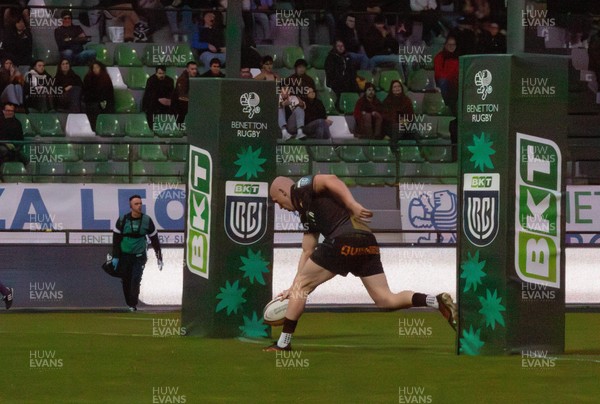 210326 - Benetton Rugby v Ospreys - United Rugby Championship - Luke Davies of Ospreys scores a try