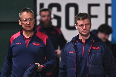 300126 - Benetton Rugby v Scarlets, United Rugby Championship -  Nigel Davies, Scarlets Interim Director of Rugby, left and Scarlets head coach Dwayne Peel arrive for the match
