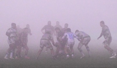 300126 - Benetton Rugby v Scarlets, United Rugby Championship - Benetton and Scarlets play on as the visibility worsens