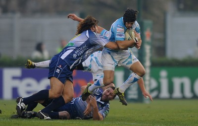 19.11.11 - Benetton Treviso v Ospreys - Heineken Cup - Matthew Morgan of Ospreys is stopped by the Treviso defence. 