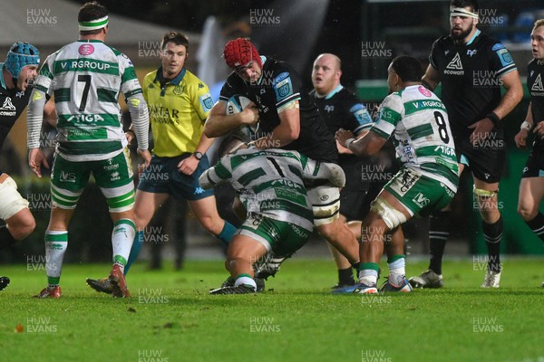 021223 - Benetton v Ospreys - United Rugby Championship - Rhys Davies of Ospreys is tackled by Thomas Gallo of Benetton 