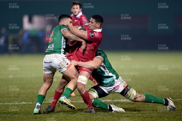 160219 - Benetton Rugby v Scarlets - Guinness PRO14 -  Dan Davis of Scarlets is tackled by Marco Zanon