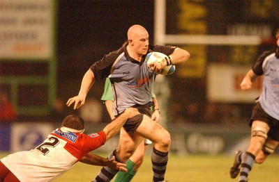 100104  Biarritz v Cardiff Blues  John Yapp is tackled by Jean-Michel Gonzalez  