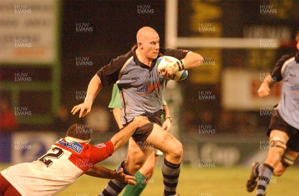 100104  Biarritz v Cardiff Blues  John Yapp is tackled by Jean-Michel Gonzalez  