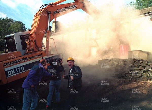 160893 -  Keith Chegwin as a bulldozer brings down houses in Newbridge for the Big Breakfast