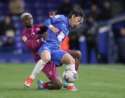 100424 - Birmingham City v Cardiff City - Sky Bet Championship - Jamilu Collins of Cardiff and Koji Miyoshi of Birmingham City 