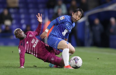 100424 - Birmingham City v Cardiff City - Sky Bet Championship - Jamilu Collins of Cardiff and Koji Miyoshi of Birmingham City 