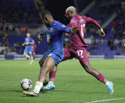 100424 - Birmingham City v Cardiff City - Sky Bet Championship - Jamilu Collins of Cardiff is blocked by Ethan Laird of Birmingham City