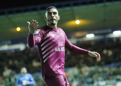 100424 - Birmingham City v Cardiff City - Sky Bet Championship - Karlan Grant of Cardiff urges on the travelling fans 