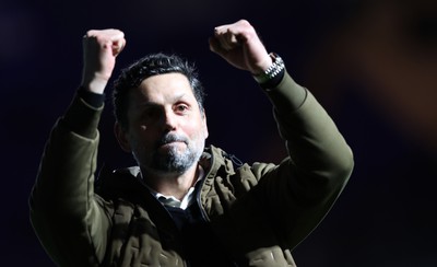 100424 - Birmingham City v Cardiff City - Sky Bet Championship - Manager Erol Bulut of Cardiff gives the victory fist in the air to the travelling fans