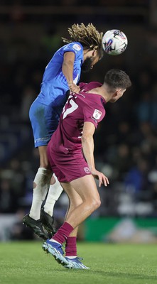 100424 - Birmingham City v Cardiff City - Sky Bet Championship - Dion Sanderson of Birmingham City hitches a lift on back of Rubin Colwill of Cardiff