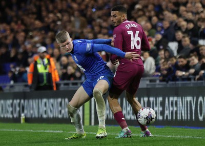 100424 - Birmingham City v Cardiff City - Sky Bet Championship - Karlan Grant of Cardiff and Jordan James of Birmingham City