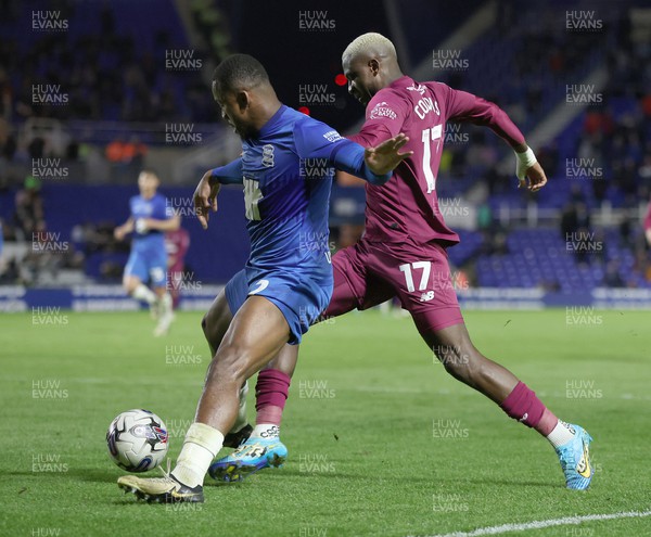 100424 - Birmingham City v Cardiff City - Sky Bet Championship - Jamilu Collins of Cardiff is blocked by Ethan Laird of Birmingham City