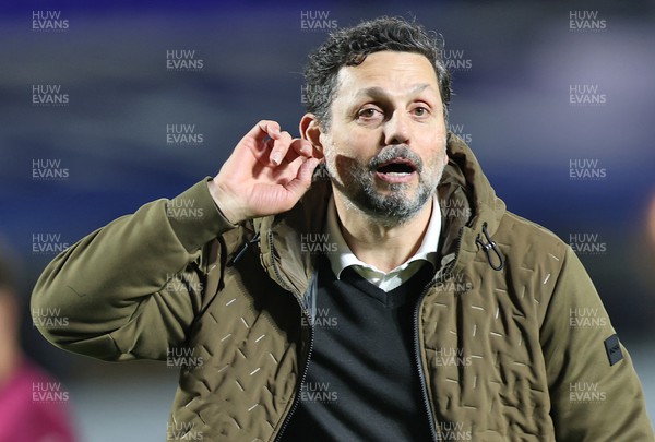 100424 - Birmingham City v Cardiff City - Sky Bet Championship - Manager Erol Bulut of Cardiff playfully listens to the travelling fans cheers