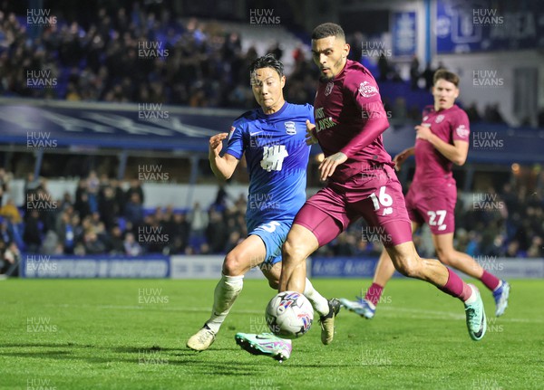100424 - Birmingham City v Cardiff City - Sky Bet Championship - Karlan Grant of Cardiff on way to goal with Paik Seung-Ho of Birmingham City