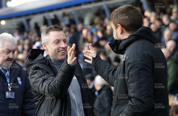 180120 - Birmingham City v Cardiff City - Sky Bet Championship - Manager Neil Harris of Cardiff greets Birmingham City's manager Pep Clotet at the start of the match
