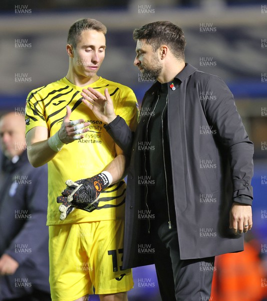 081122 - Birmingham City v Swansea City - Sky Bet Championship - Head Coach Russell Martin of Swansea shakes hands with Goalkeeper Steven Benda of Swansea at the end of the match 
