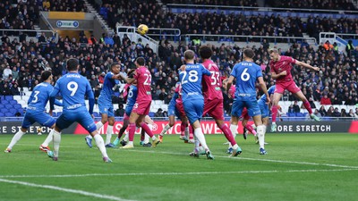 130124 - Birmingham City v Swansea City, EFL Sky Bet Championship - Harry Darling of Swansea City, right, heads to score goal