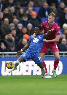 130124 - Birmingham City v Swansea City, EFL Sky Bet Championship - Siriki Dembele of Birmingham City and Harry Darling of Swansea City compete for the ball