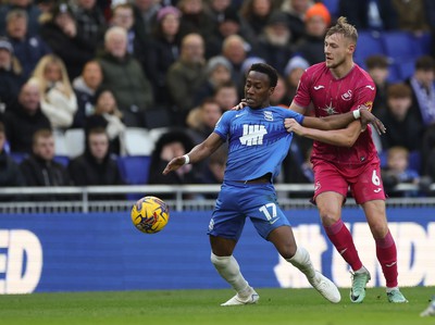 130124 - Birmingham City v Swansea City, EFL Sky Bet Championship - Siriki Dembele of Birmingham City and Harry Darling of Swansea City compete for the ball