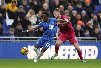 130124 - Birmingham City v Swansea City, EFL Sky Bet Championship - Siriki Dembele of Birmingham City and Harry Darling of Swansea City compete for the ball