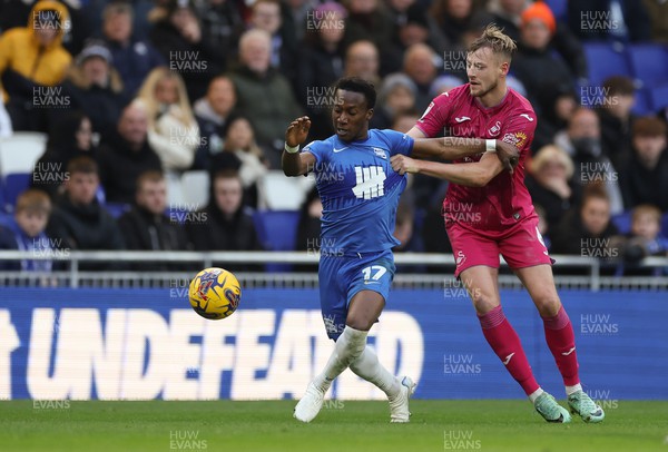 130124 - Birmingham City v Swansea City, EFL Sky Bet Championship - Siriki Dembele of Birmingham City and Harry Darling of Swansea City compete for the ball