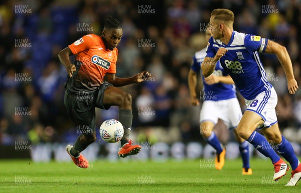 170818 - Birmingham City v Swansea City, Sky Bet Championship - Joel Asoro of Swansea City is tackled by Michael Morrison of Birmingham City as he charges forward