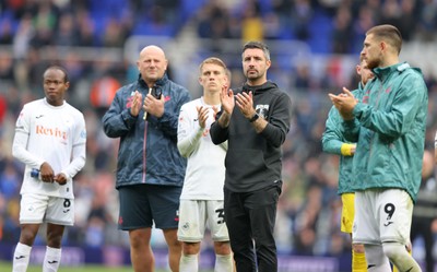 200925 - Birmingham City v Swansea City - Sky Bet Championship - The team led by Swansea manager Alan Sheehan applaud the travelling fans