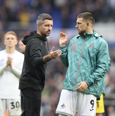 200925 - Birmingham City v Swansea City - Sky Bet Championship - Swansea manager Alan Sheehan with Zan Vipotnik of Swansea at the end of the match
