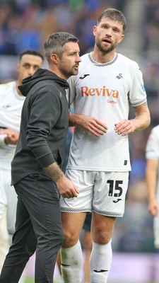 200925 - Birmingham City v Swansea City - Sky Bet Championship - Swansea manager Alan Sheehan with Cameron Burgess of Swansea at the end of the match