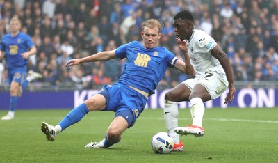 200925 - Birmingham City v Swansea City - Sky Bet Championship - Zeidane Inoussa of Swansea and Christoph Klarer of Birmingham