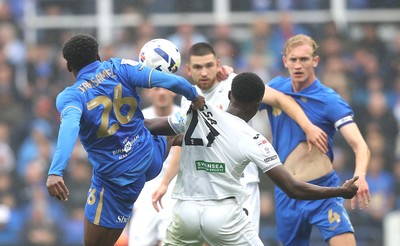 200925 - Birmingham City v Swansea City - Sky Bet Championship - Zeidane Inoussa of Swansea has shirt pulled by Bright Osayi-Samuel of Birmingham