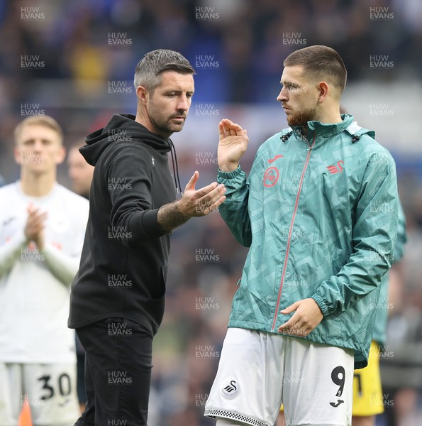200925 - Birmingham City v Swansea City - Sky Bet Championship - Swansea manager Alan Sheehan with Zan Vipotnik of Swansea at the end of the match