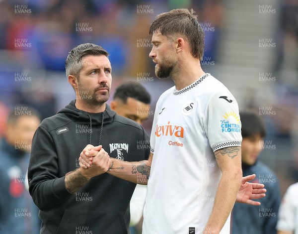 200925 - Birmingham City v Swansea City - Sky Bet Championship - Swansea manager Alan Sheehan with Cameron Burgess of Swansea at the end of the match